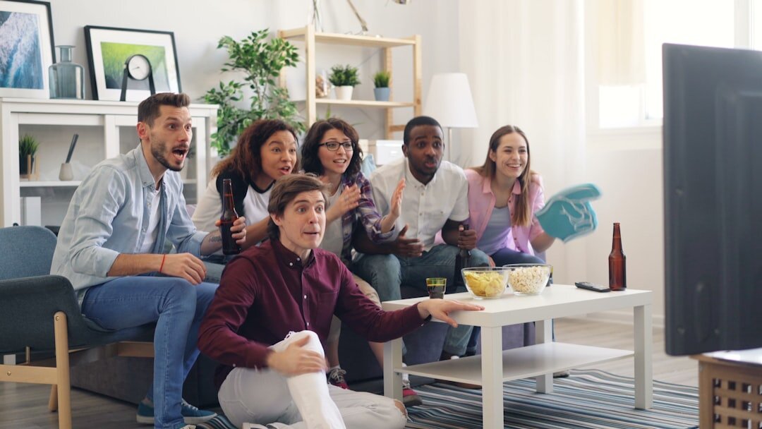 group watching old tv