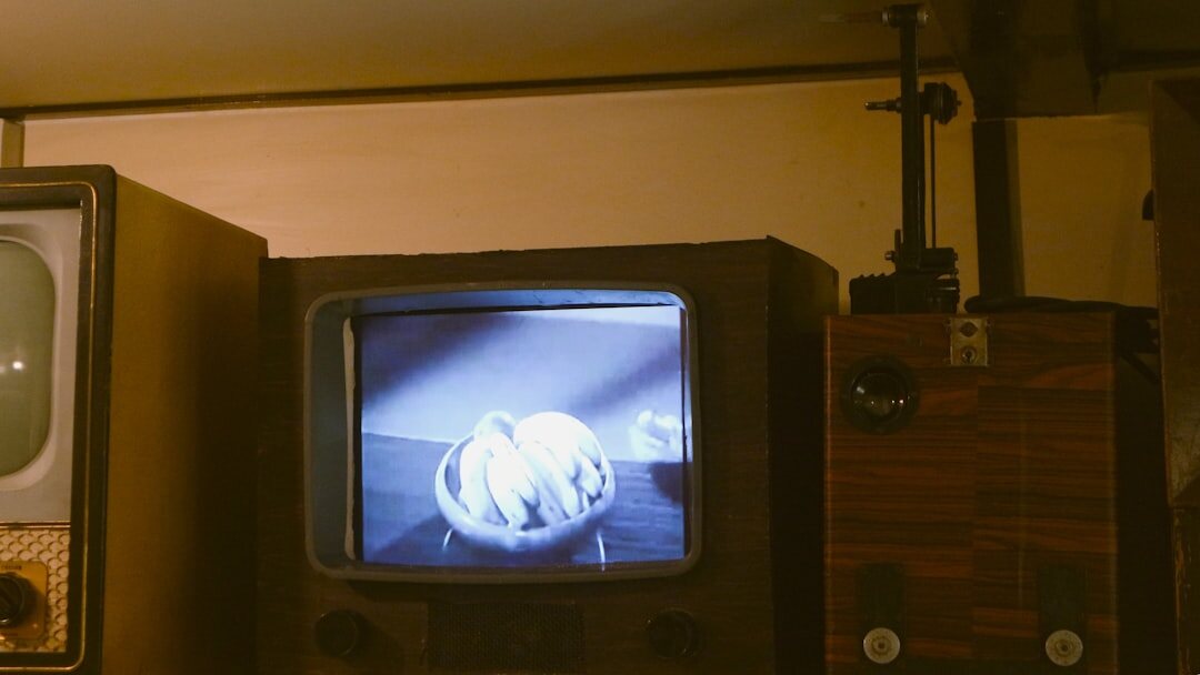 group watching old tv